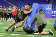 Defensive lineman Bryan Bresee of Clemson participates in a drill during the NFL Combine